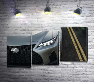 Витончена фара сріблястого автомобіля Lexus IS 300