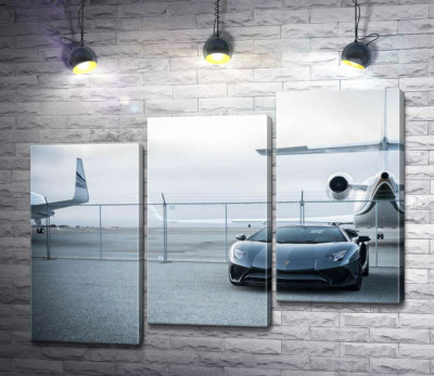 Модульна картина "Чорний автомобіль Lamborghini Aventador на фоні літаків"