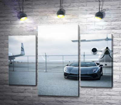 Модульная картина "Чёрный автомобиль Lamborghini Aventador на фоне самолетов"