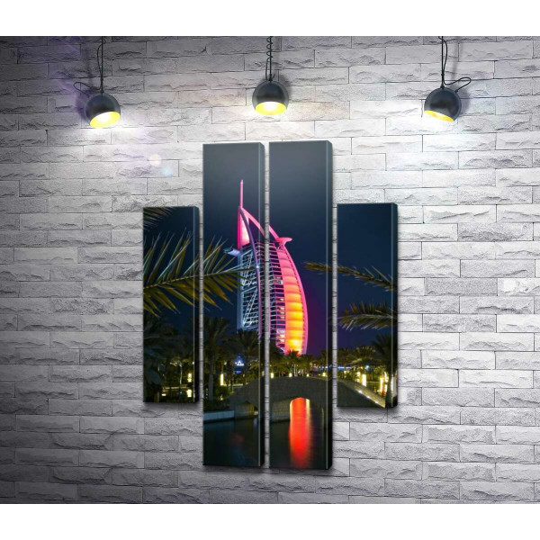 Ночной вид на яркий парус отеля Burj Al Arab