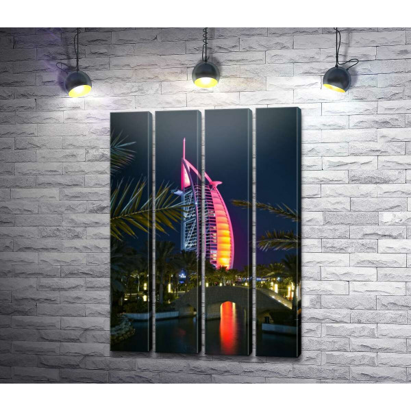 Ночной вид на яркий парус отеля Burj Al Arab