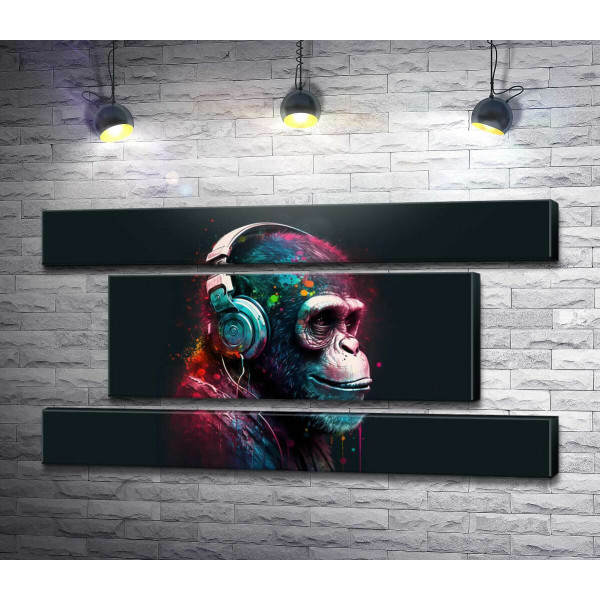 Шимпанзе меломан у навушниках