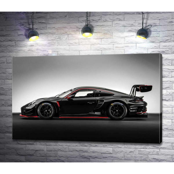 Чорний спорткар Porsche 911 GT3 R