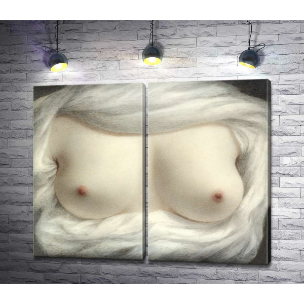 Красиві жіночі груди в облямівці білої тканини