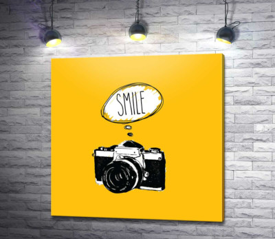 Фотокамера і напис:"Smile"