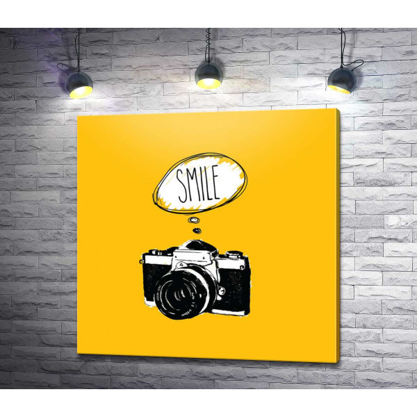 Фотокамера і напис:"Smile"