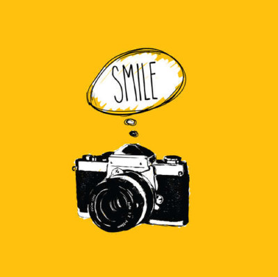 Фотокамера і напис:"Smile"