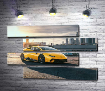 Модульна картина "Жовтий автомобіль Lamborghini Huracan в променях сонця"