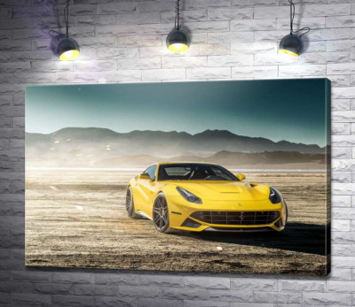 Желтый автомобиль Ferrari F12 berlinetta в пустыне