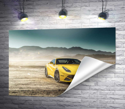 Желтый автомобиль Ferrari F12 berlinetta в пустыне
