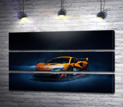Модульна картина "Золотий автомобіль McLaren Artura в серпанку"