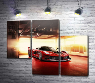 Модульна картина "Червоний автомобіль Ferrari FXX-K в ангарі"