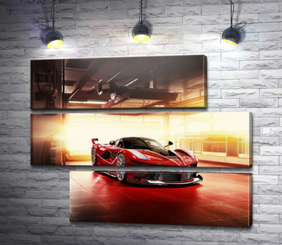 Модульна картина "Червоний автомобіль Ferrari FXX-K в ангарі"
