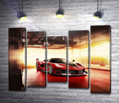 Червоний автомобіль Ferrari FXX-K в ангарі
