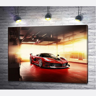 Червоний автомобіль Ferrari FXX-K в ангарі