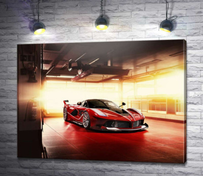 Червоний автомобіль Ferrari FXX-K в ангарі