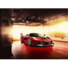 Червоний автомобіль Ferrari FXX-K в ангарі