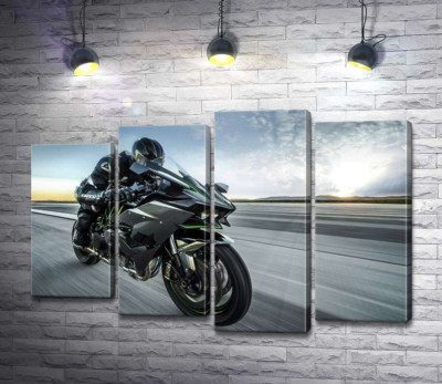 Модульная картина "Гонщик мчит на черном мотоцикле Kawasaki Ninja"