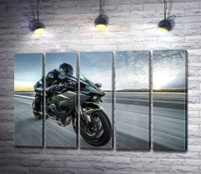 Модульная картина "Гонщик мчит на черном мотоцикле Kawasaki Ninja"
