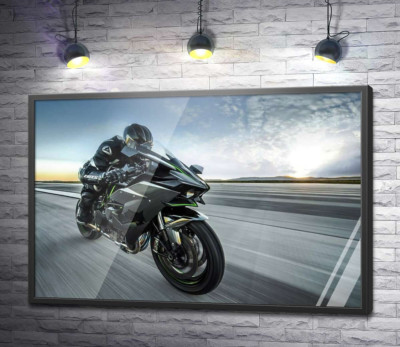 Постер "Гонщик мчить на чорному мотоциклі Kawasaki Ninja"