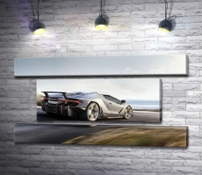 Модульна картина "Сріблястий автомобіль Lamborghini Centenario мчить по дорозі"