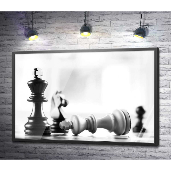 Шахматные фигуры: победа черных над белыми