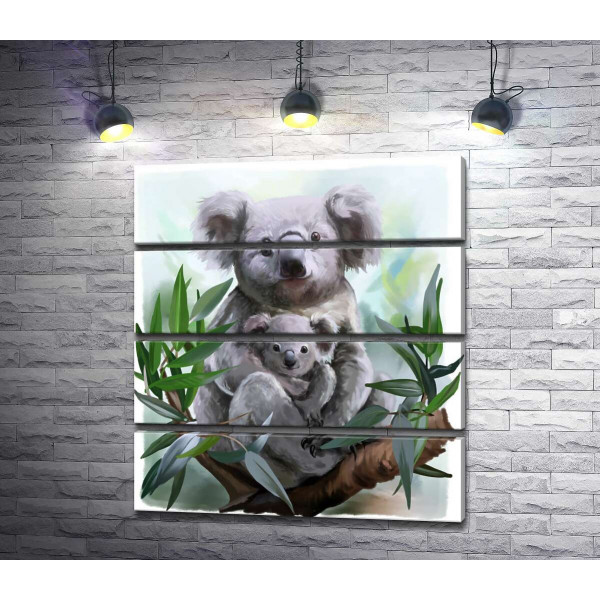 Уютная коала с детенышем на ветке