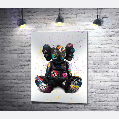 Сидячий KAWS