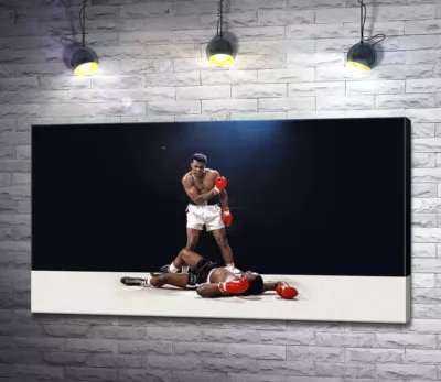 Победитель боксер Мухаммед Али (Muhammad Ali) стоит над побежденным Сонни Листоном (Sonny Liston)