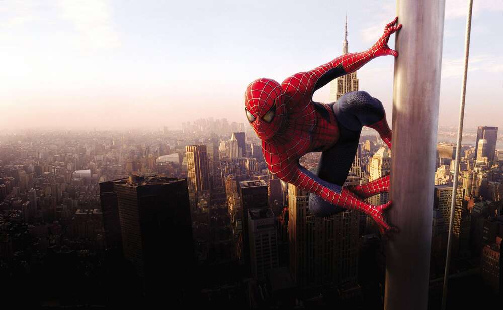картина-постер Человек-паук готовится к прыжку на вершине небоскреба