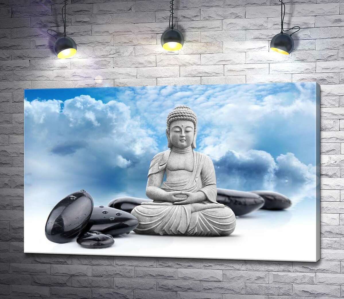 картина Будда в позе лотоса среди черных камней на фоне лазурного неба