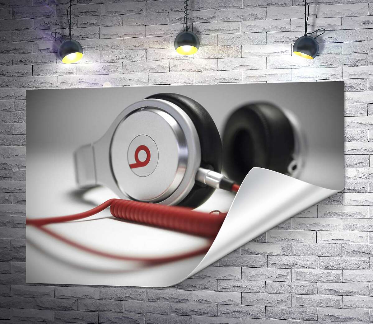 друк Тонкі форми білого корпусу навушників Beats у поєднанні із завитками червоного провода