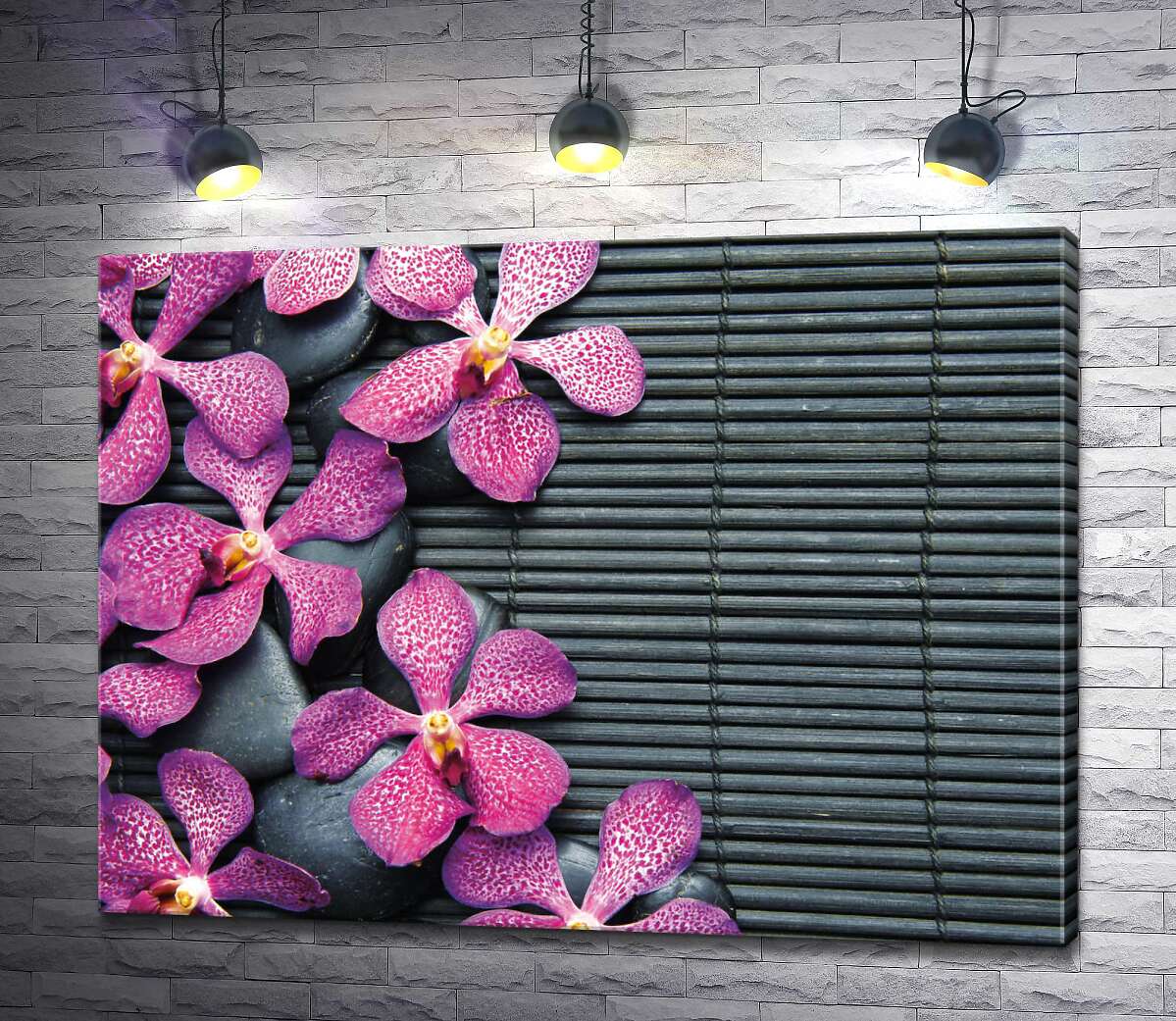 картина Узор красочных орхидей и черных камней на бамбуковом коврике