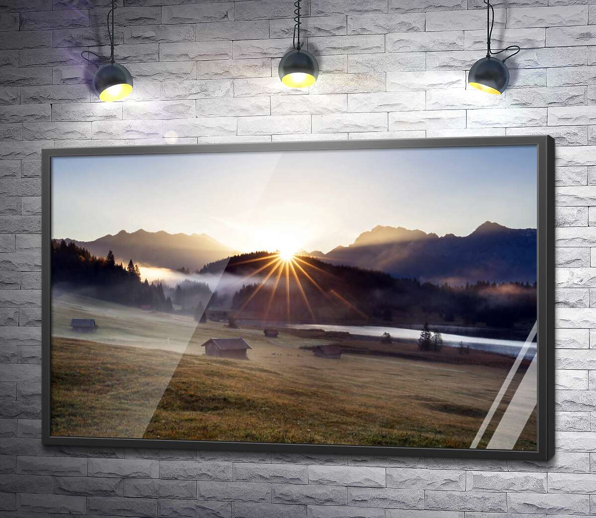 постер Лучи солнца рассеивают утренний туман над горной долиной