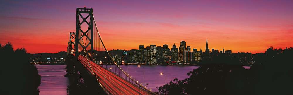 картина-постер Міст Бей-Брідж (Bay Bridge) веде до вечірнього Сан-Франциско