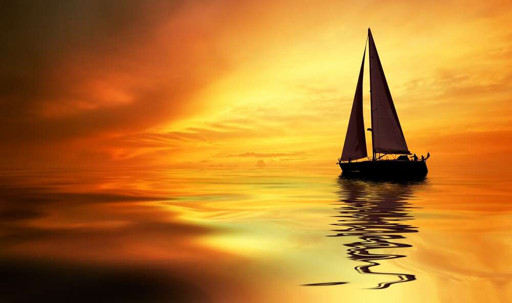 картина-постер Темный силуэт яхты выделяется на оранжевом слиянии моря и неба