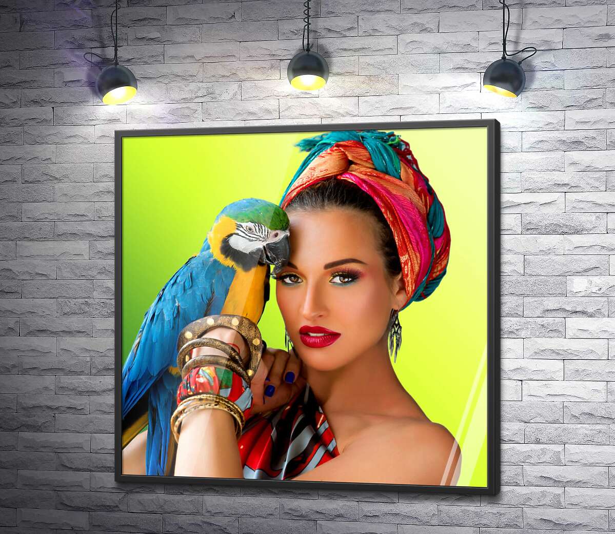 постер Дівчина в яскравому тюрбані тримає на руці жовто-блакитного папугу ара