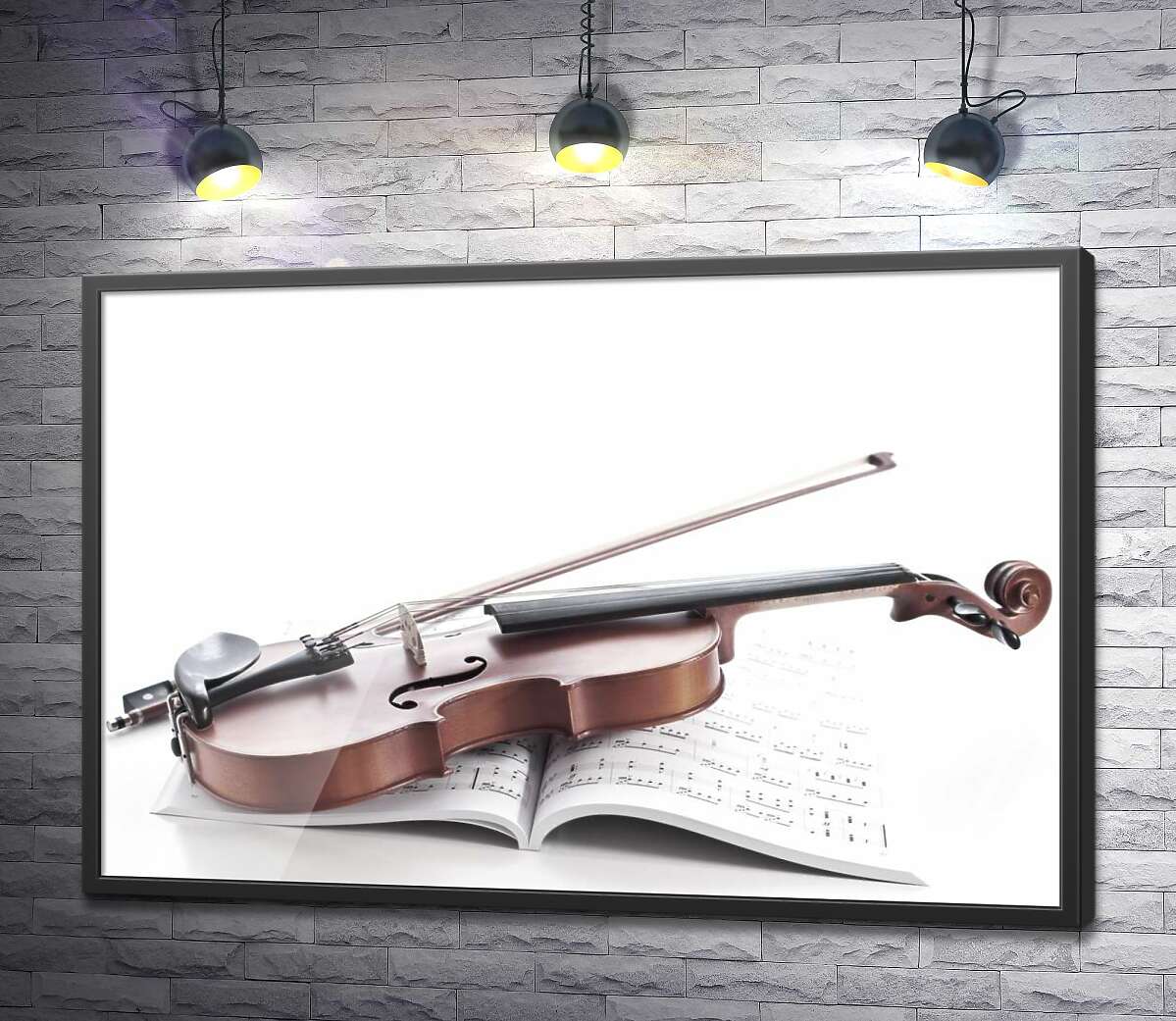 постер Смычок и скрипка лежат на книге с нотами