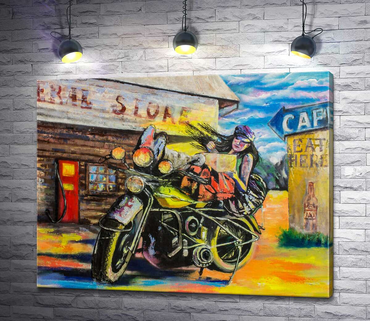 картина Байкерша лежить на мотоциклі біля старої автозаправної станції