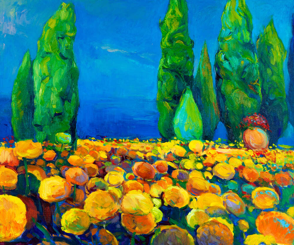 картина-постер Пышная клумба из желтых цветов на фоне деревьев
