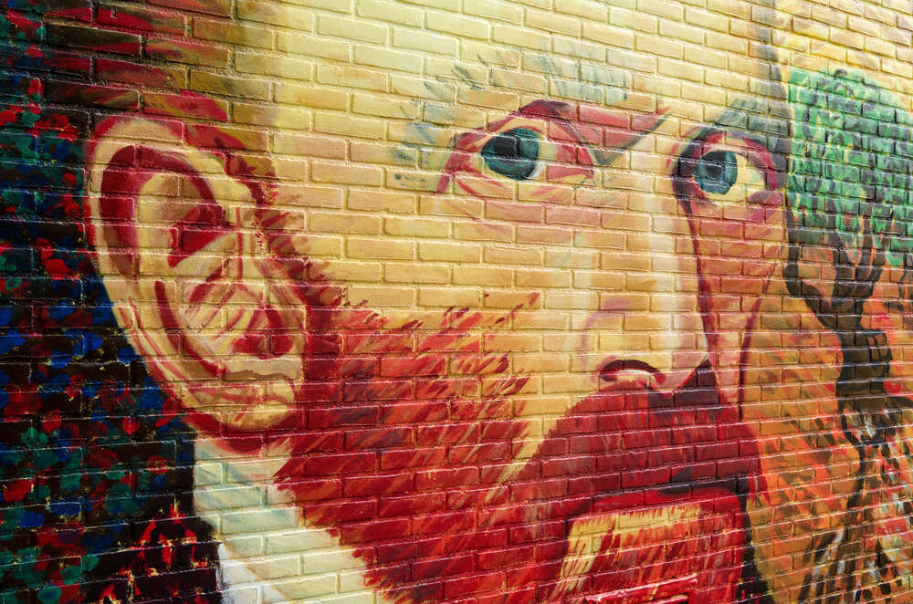 картина-постер Портрет Вінсента Ван Гога виблискує фарбами на стіні