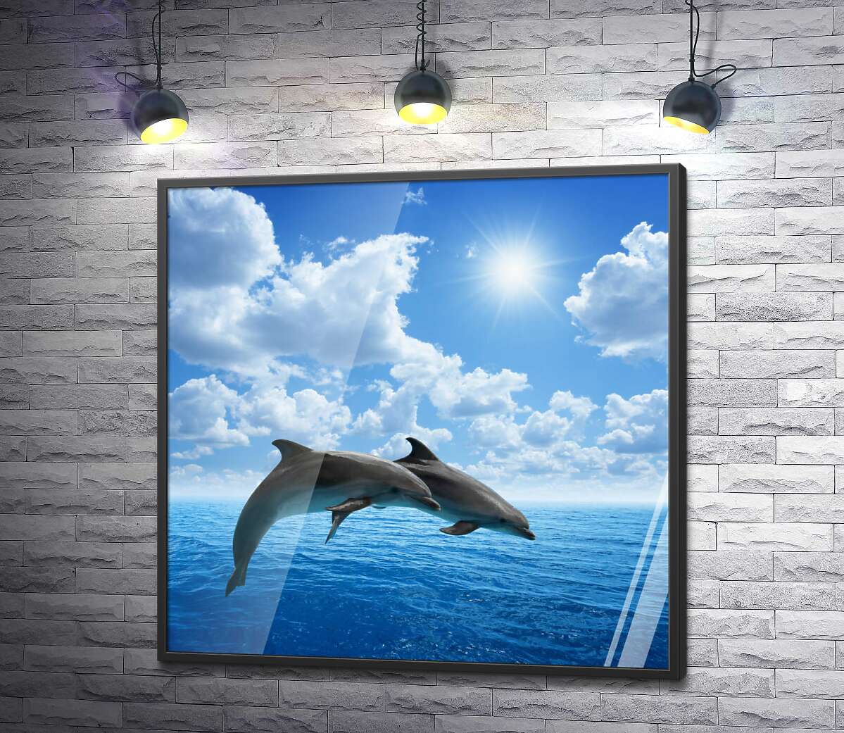 постер Пара дельфінів парить над поверхнею океану