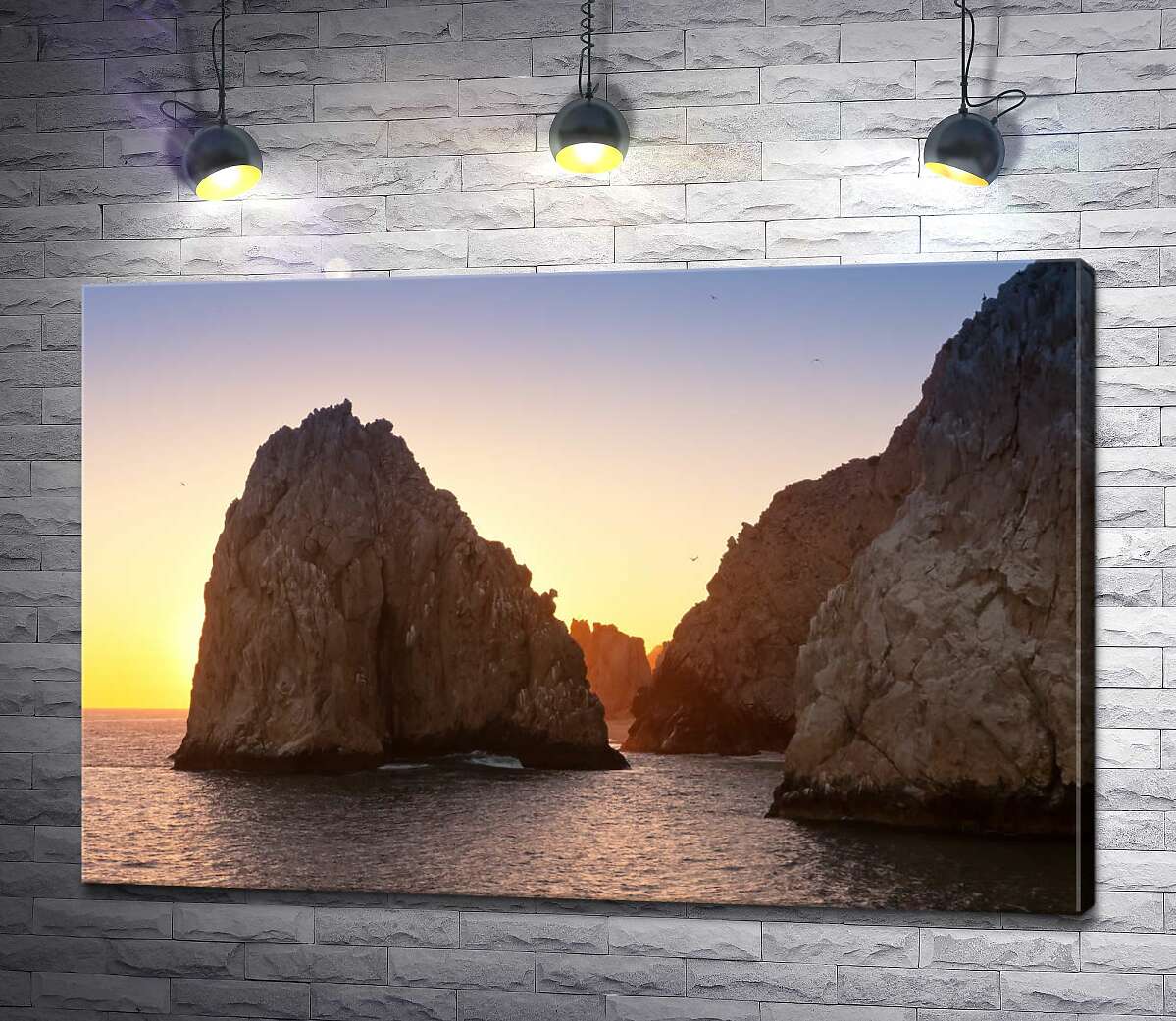 картина Острые пики морских скал в вечерних лучах солнца