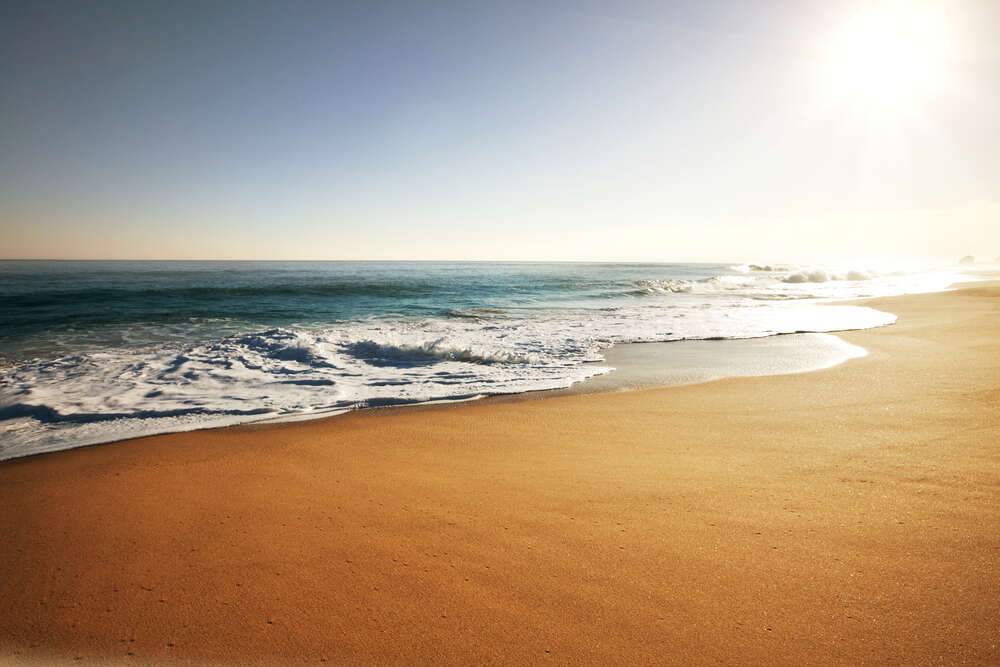 картина-постер Ровная поверхность пляжного песка на берегу океана