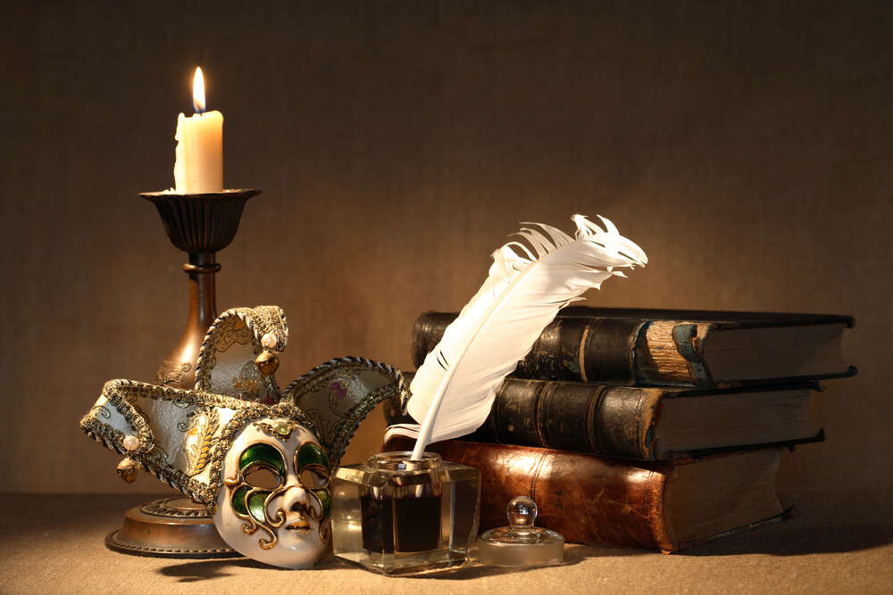 картина-постер Книги, свеча, чернильница и венецианская маска в изысканном натюрморте
