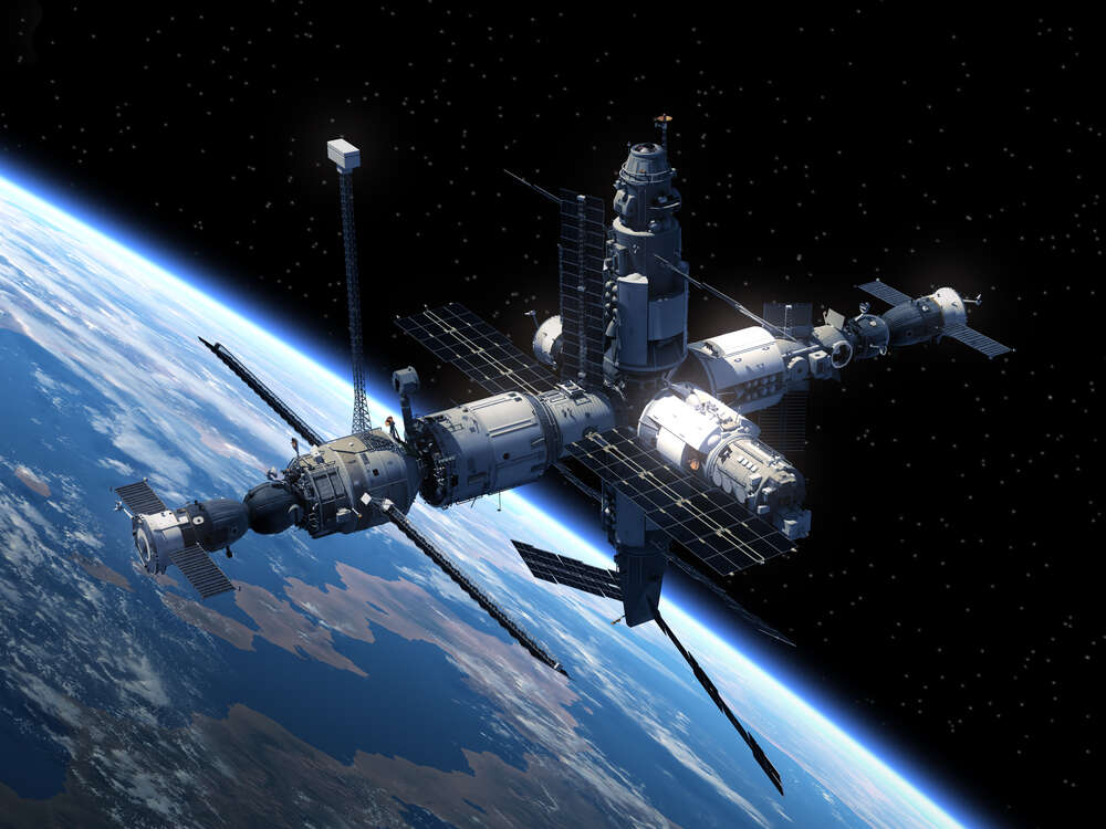 картина-постер Космічна станція летить по земній орбіті