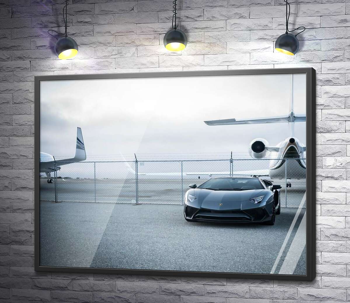постер Чорний автомобіль Lamborghini Aventador на фоні літаків