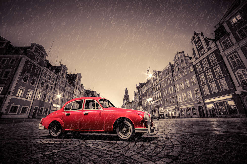 картина-постер Красный ретро-автомобиль на дождливой мостовой Вроцлава