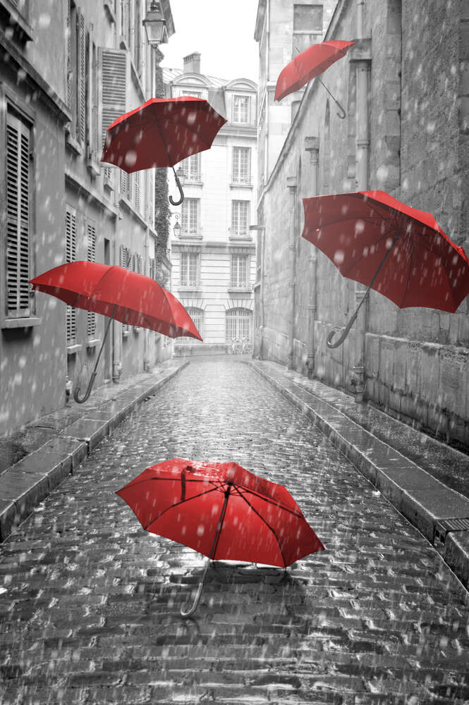 картина-постер Красные зонтики летящие по улице во время дождя