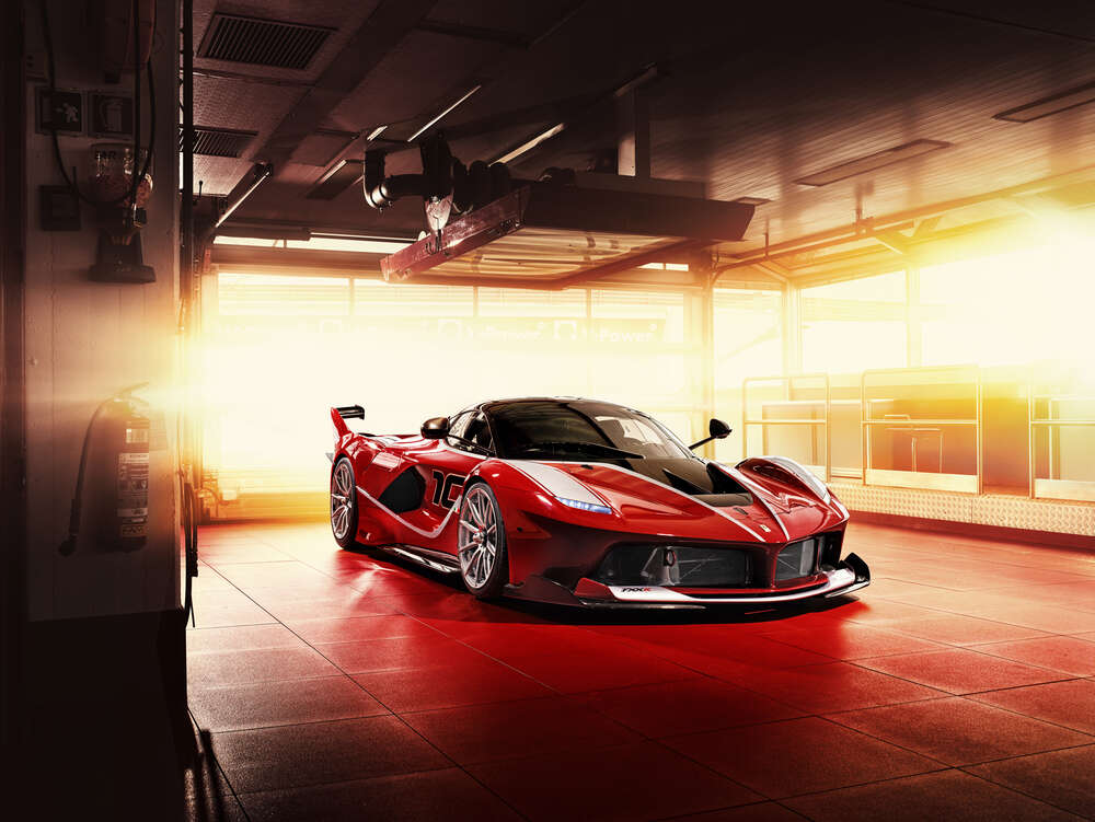 картина-постер Червоний автомобіль Ferrari FXX-K в ангарі